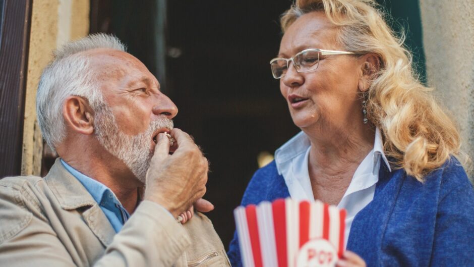 senior citizens enjoying popcorn