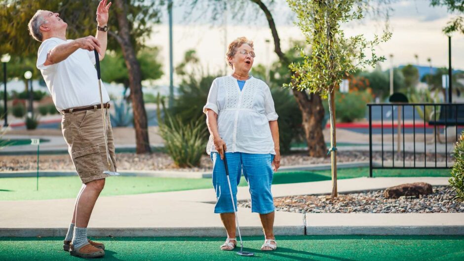 Older Couple Golfing