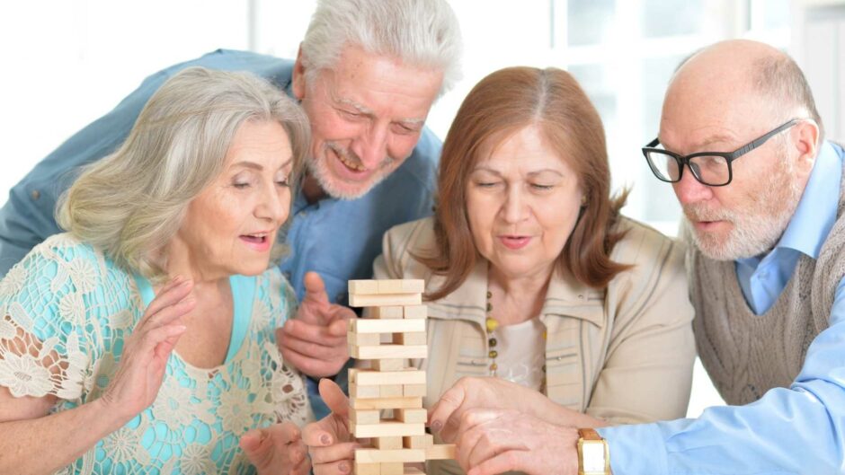 Elderly Man Playing a Game