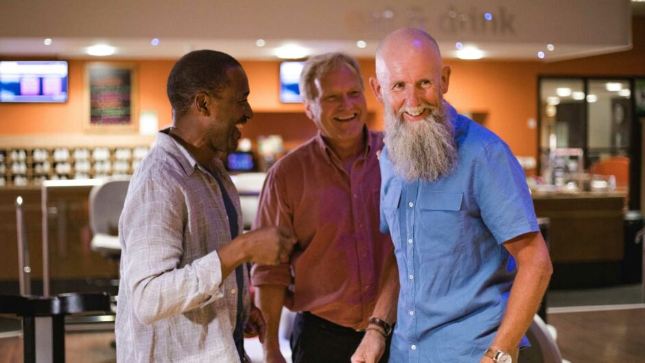 Older men enjoying a night out.